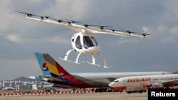 A test flight of the "Volocopter 2X" drone taxi during an Urban Air Mobility Airport Demo event at Gimpo Airport in Seoul, South Korea, November 11, 2021. (REUTERS/Heo Ran)