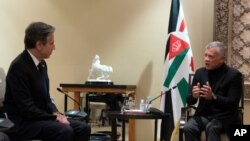 Secretary of State Antony Blinken, left, listens during a meeting with Jordan's King Abdullah II at Bayt Al Urdon, May 26, 2021, in Amman, Jordan. 