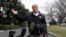 President Donald Trump talks with reporters outside the White House, March 8, 2019, in Washington.