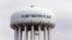 FILE - The Flint, Michigan, water tower is seen in a Feb. 5, 2016, photo. Flint is under a public health emergency after its drinking water became tainted when the city switched from the Detroit system and began drawing from the Flint River in 2014 to save money.