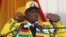 President Emmerson Mnangagwa greets supporters of his ruling ZANU PF party gather for an election rally in Chinhoyi, Zimbabwe, July 17, 2018. 