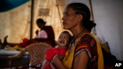 Faayilii - Haadha daa'imni hanqina nyaataatiin jalaa hubamte qabatttee jirtu, Abi Adii, Tigraay, Caamsaa 21, 2021