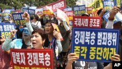 지난해 6월 서울에서 중국 내 탈북자들의 보호와 강제 북송 중단을 요구하는 시위가 벌어졌다. (자료사진)