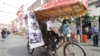 Chinese Farmer Bikes to the Olympics