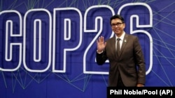 Le président malgache Andry Rajoelina arrive pour le sommet de la COP26 au Scottish Event Campus (SEC) à Glasgow, en Écosse, le lundi 1er novembre 2021.