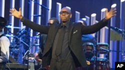 FILE - In this Oct. 27, 2019 file photo, Dave Chappelle is honored with the Mark Twain Prize for American Humor at the Kennedy Center for the Performing Arts in Washington. (Photo by Owen Sweeney/Invision/AP, File)