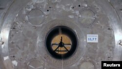 A giant magnet with a magnetic field of 11.7 T. is seen at the Neurospin facility of the CEA Saclay Nuclear Research Center, near Paris, France, Sept. 7, 2019.