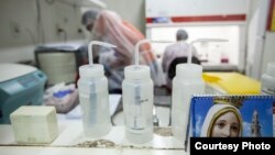 The mobile Zika surveillance project, ZIBRA, is using DNA sequencing technology in the back of its lab-equipped minibus. (Courtesy - Ricardo Funari)