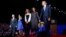 President Barack Obama walks on stage with first lady Michelle Obama, daughter Malia, Vice President Joe Biden and his wife Jill Biden after his farewell address at McCormick Place in Chicago, Jan. 10, 2017. 