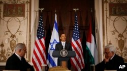 President Barack Obama meets with Israeli Prime Minister Benjamin Netanyahu, left, and Palestinian President Mahmoud Abbas in New York, Sept. 22, 2009.