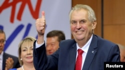 Czech President Milos Zeman reacts after his victory over pro-EU academic Jiri Drahos in the presidential election in Prague, Czech Republic, Jan. 27, 2018.