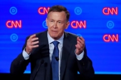 FILE - Democratic 2020 U.S. presidential candidate former Colorado Governor John Hickenlooper speaks on the first night of the second 2020 Democratic U.S. presidential debate in Detroit.