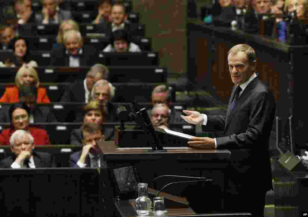 Polish Prime Minister Donald Tusk speaks before the Parliament, saying that recent NATO and Polish intelligence information shows that regular Russian army units are operating in eastern Ukraine, Warsaw, Poland, Aug. 27, 2014.