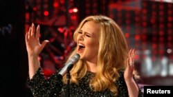 Two stag deer pause during a rutt at Bradgate Park in Newtown Linford, Britain.