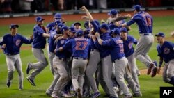 Chicago Cubs celebrate after Game 7 of the Major League Baseball World Series against the Cleveland Indians Thursday, Nov. 3, 2016, in Cleveland. The Cubs won 8-7 in 10 innings to win the series 4-3.