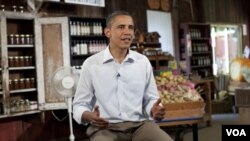 Presiden AS Barack Obama menyampaikan pidato mingguannya dari negara bagian Illinois (20/8).