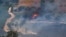 A fire blazes on the Israeli side of the Israel-Lebanon border following attacks from Lebanon, amid cross-border hostilities between Hezbollah and Israeli forces, in northern Israel, June 18, 2024.