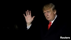 Presiden AS Donald Trump di Gedung Putih setibanya di Washington dari Paris, 11 November 2018.