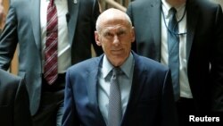 Director of National Intelligence Dan Coats arrives for a closed senators-only Capitol Hill briefing on election security at the U.S. Capitol in Washington, Aug. 22, 2018.