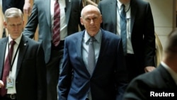 Director of National Intelligence Dan Coats arrives for a closed senators-only Capitol Hill briefing on election security at the U.S. Capitol in Washington, Aug. 22, 2018.
