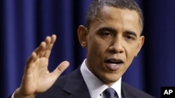 US President Barack Obama answers questions during a press conference on the White House complex in Washington, March 11, 2011