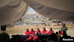 Julius Malema, leader of South Africa's Economic Freedom Fighters (EFF), gestures during a media briefing in Alexander township near Sandton, South Africa, Aug. 17, 2016.