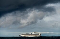 Carrying multiple people who have tested positive for COVID-19, the Grand Princess maintains a holding pattern about 30 miles off the coast of San Francisco, March 8, 2020.