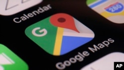 FILE - The Google Maps app is seen on a smartphone, in New York, March 22, 2017.