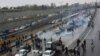  In this Nov. 16, 2019 file photo, protestors block a road after authorities raised gasoline prices, in Tehran, Iran.