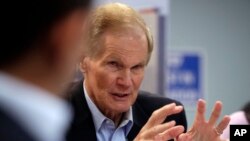FILE - Sen. Bill Nelson, D-Fla., speaks during a roundtable discussion with education leaders in Miami, Aug. 6, 2018.