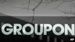 A sign marks the location of the Groupon headquarters on November 30, 2010 in Chicago, Illinois.