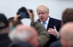 Britain's Prime Minister Boris Johnson speaks at Jacksons Wharf Marina in Hartlepool following local elections, Britain, May 7, 2021.