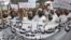 In this Sept. 7, 2018 file photo, Pakistani Islamists protest the appointment of a minority Ahmadi Muslim as an adviser to the government, in Lahore, Pakistan.