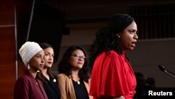FILE - Congresswomen Ilhan Omar (D-MN), Alexandria Ocasio-Cortez (D-NY), Rashida Tlaib (D-MI) and Ayanna Pressley (D-MA) hold a news conference on Capitol Hill in Washington, July 15, 2019. 