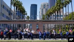 Members of the the Writers Guild of America picket outside Fox Studios on Tuesday, May 2, 2023, in Los Angeles, California.(AP Photo/Ashley Landis)