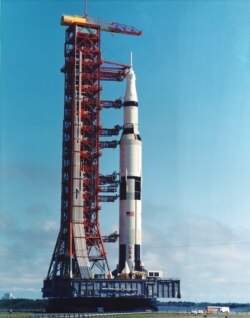 The Apollo 11 Saturn V rocket is being moved to the pad aboard the Mobile Launch Platform (MLP) at Cape Canaveral May, 1969.