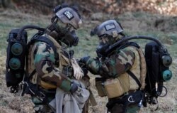 FILE - Soldiers from the 2nd Infantry Division of the U.S. participate in a drill at Camp Casey in Dongducheon, north of Seoul, South Korea, March 3, 2011.