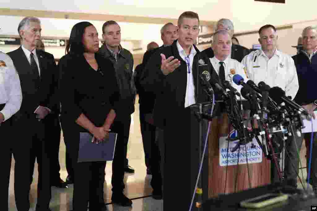 Transportation Secretary Sean Duffy, with District of Columbia Mayor Muriel Bowser, left, and other officials, speaks during a news conference at Ronald Reagan Washington National Airport, Jan. 30, 2025, in Arlington, Va. 