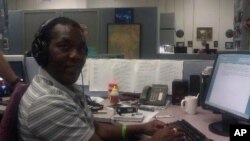 John Tanza busy at work at the VOA headquarters in Washington DC