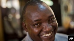 Gambian President-elect Adama Barrow sits for an interview with the Associated Press at his residence in Yundum, Gambia, Dec. 3, 2016.