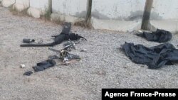 Fotografija višeg zvaničnka koalicije na kojoj se vide ostaci naoružane bespilotne letelice koja je pokušala da napadne bazu koalicije predvođene SAD koja se bori protiv ostataka grupe Islamska država u Iraku, 3. januara 2022.