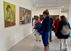 Crowds pack the Pinault Collection days after its opening. (L. Bryant/VOA).