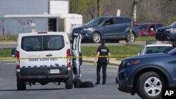Policija blizu mjesta pucnjave u Fredericu, Maryland (Foto: AP/Julio Cortez)