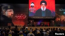 Pristalice slušaju govor lidera Hezbolaha Nasralaha u Bejrutu