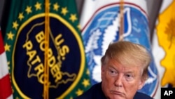 FILE - President Donald Trump participates in a roundtable on immigration and border security, at the U.S. Border Patrol Calexico Station in Calexico, California, April 5, 2019.