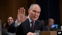FILE - Environmental Protection Agency Administrator-designate Scott Pruitt testifies on Capitol Hill in Washington, Jan. 18, 2017, at his confirmation hearing before the Senate Environment and Public Works Committee. 