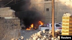A Shaolin martial arts student practices on a hilltop in Kabul, Afghanistan.