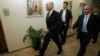 Israel's Prime Minister Ehud Olmert (L) and Minister of Internal Security Avi Dichter (R) arrive for the weekly cabinet meeting in Jerusalem, July 15, 2007. Dichter was appointed as Israel's new defense minister by current prime minister Benjamin Netanyah