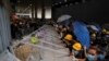 Protesters are seen as they forcefully enter the Legislative Council in Hong Kong, July 1, 2019.