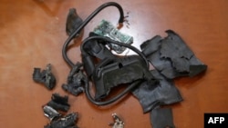 A photo taken on Sept. 18, 2024, in Beirut's southern suburbs shows the remains of exploded pagers on display at an undisclosed location in Lebanon.